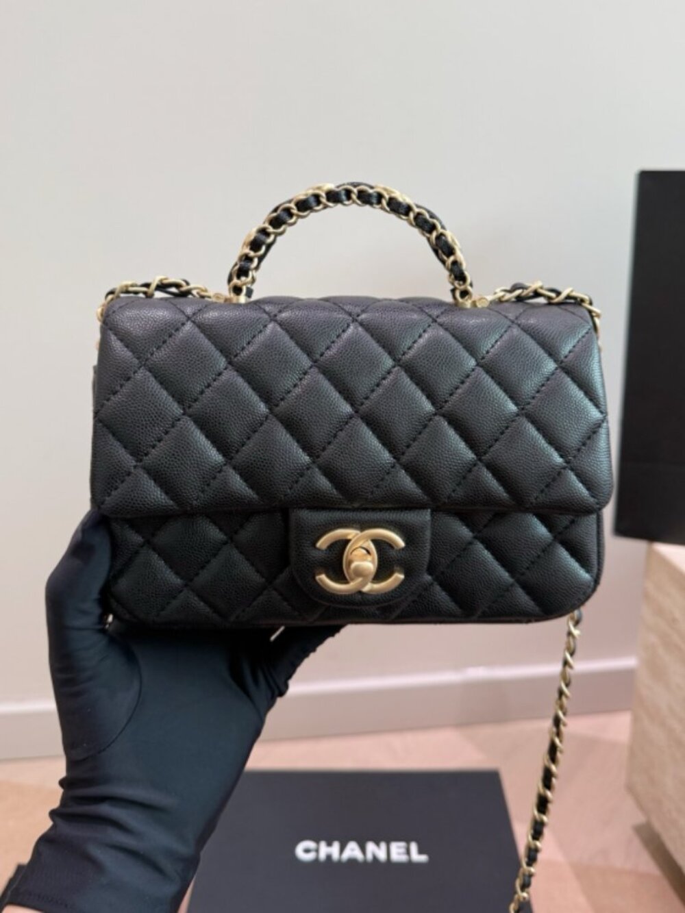 Chanel.Black and Gold Litchi-Pattern Handle Bag